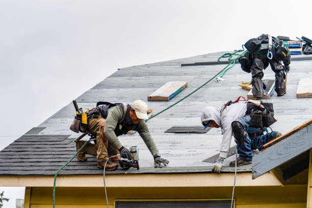Professional Roofing technician working in New Castle, VA